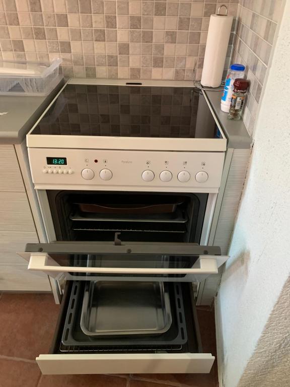 Kuchyň nebo kuchyňský kout v ubytování veranda