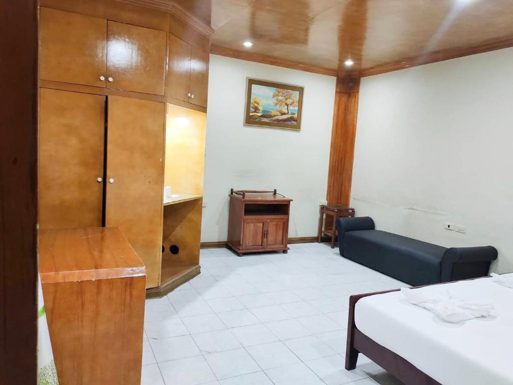 Postel nebo postele na pokoji v ubytování Parkview Hotel