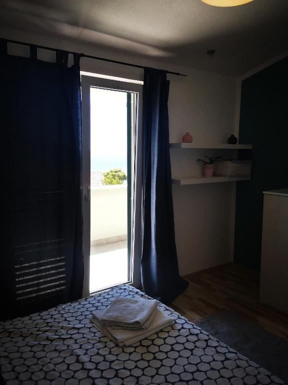 Posteľ alebo postele v izbe v ubytovaní Apartman Dane