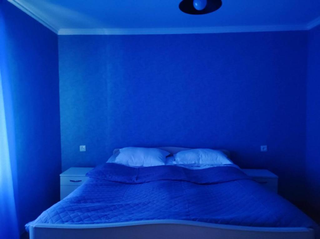 Postel nebo postele na pokoji v ubytování House in Gergeti