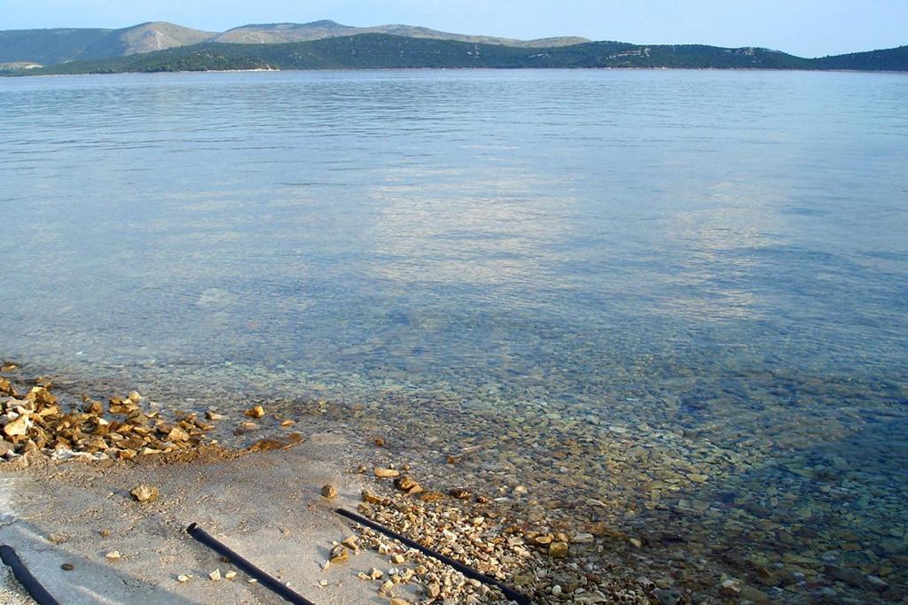 Fotografia z galérie ubytovania Apartments by the sea Krapanj, Sibenik - 18180 v Šibeniku