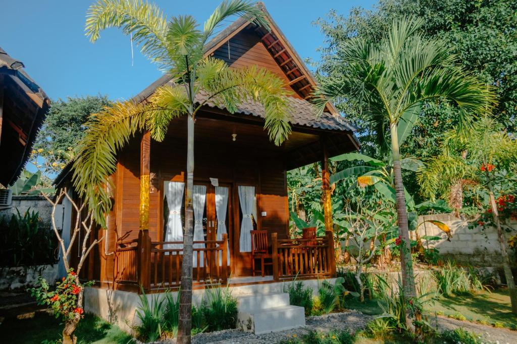Zahrada ubytování Kurnia Guest House & Spa