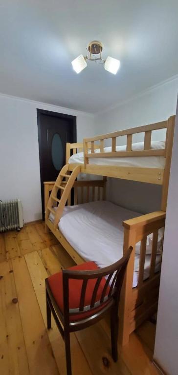 Postel nebo postele na pokoji v ubytování House in Gergeti