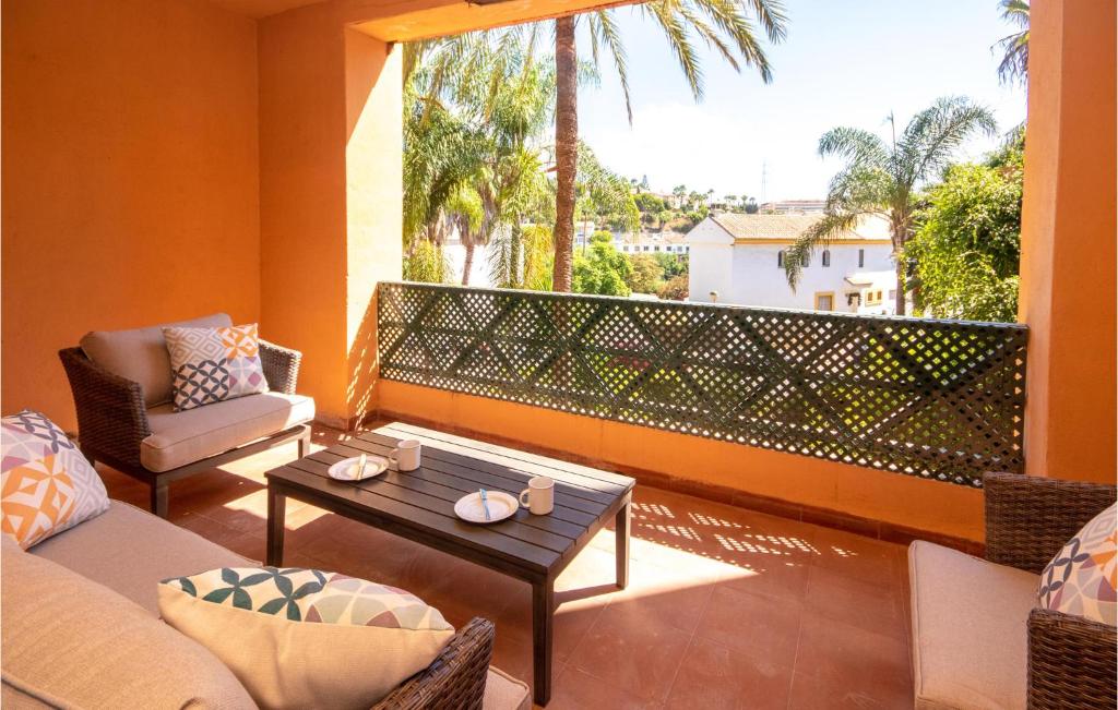 A balcony or terrace at Nice Apartment In Calahonda With Wifi