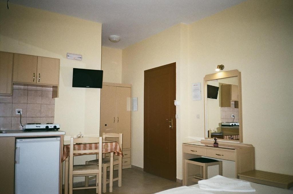 Kuchyň nebo kuchyňský kout v ubytování John Apartments