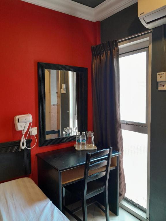 Postel nebo postele na pokoji v ubytování V HOTEL