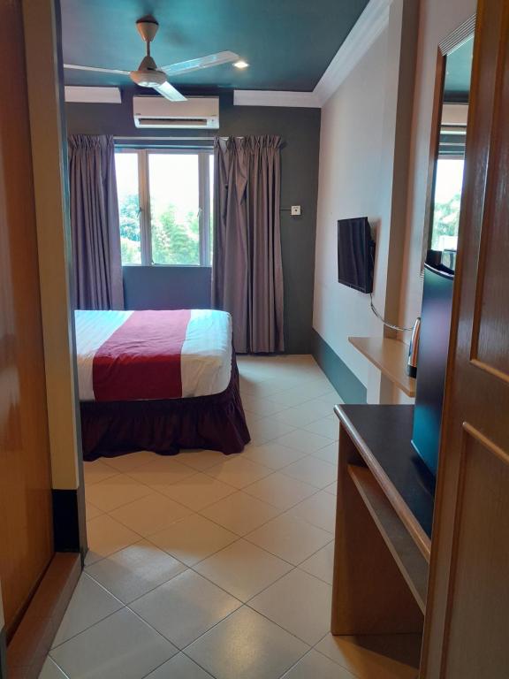 Postel nebo postele na pokoji v ubytování V HOTEL