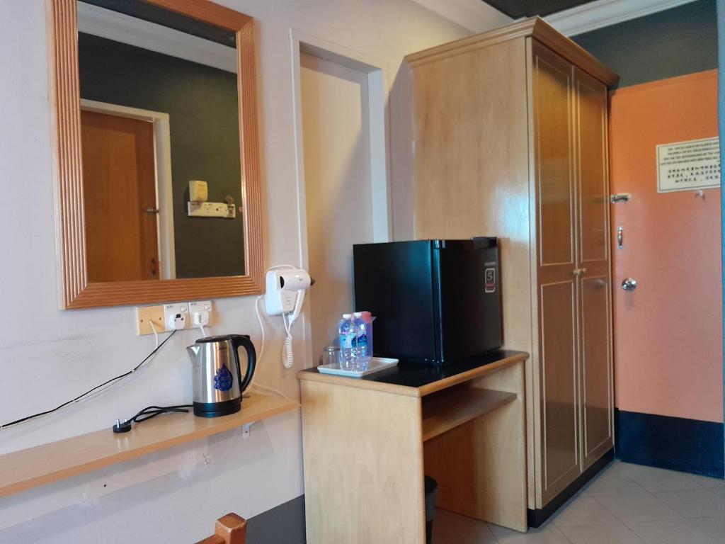 Kuchyň nebo kuchyňský kout v ubytování V HOTEL