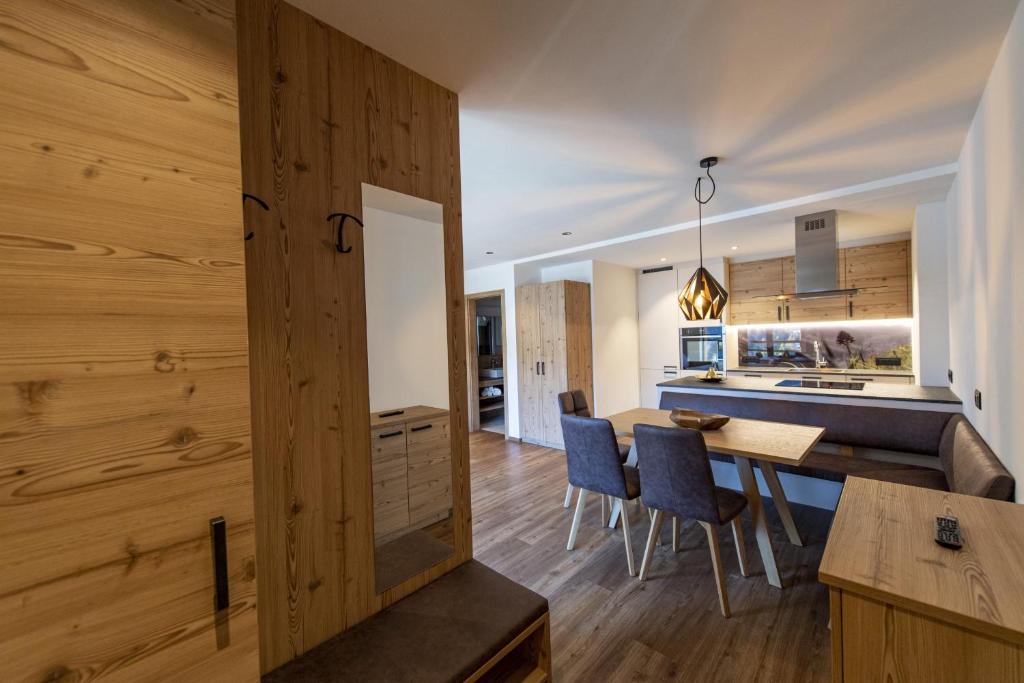 A kitchen or kitchenette at Luech da Perteut - Panorama and Wellness