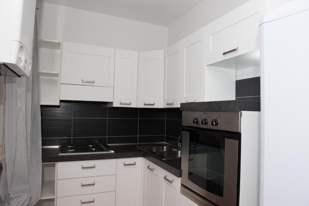 Kuchyň nebo kuchyňský kout v ubytování B&B La Pellizzera
