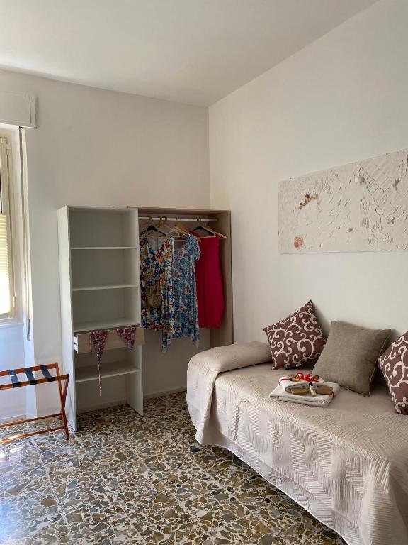 Postel nebo postele na pokoji v ubytování Rossocorallo Rooms