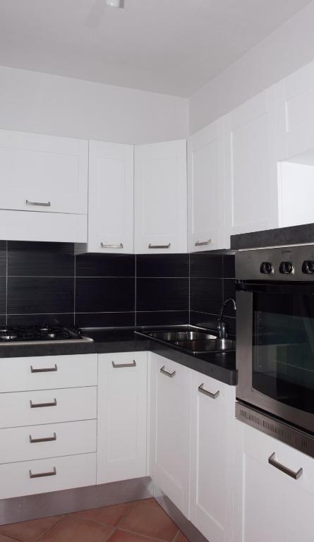 Kuchyň nebo kuchyňský kout v ubytování B&B La Pellizzera