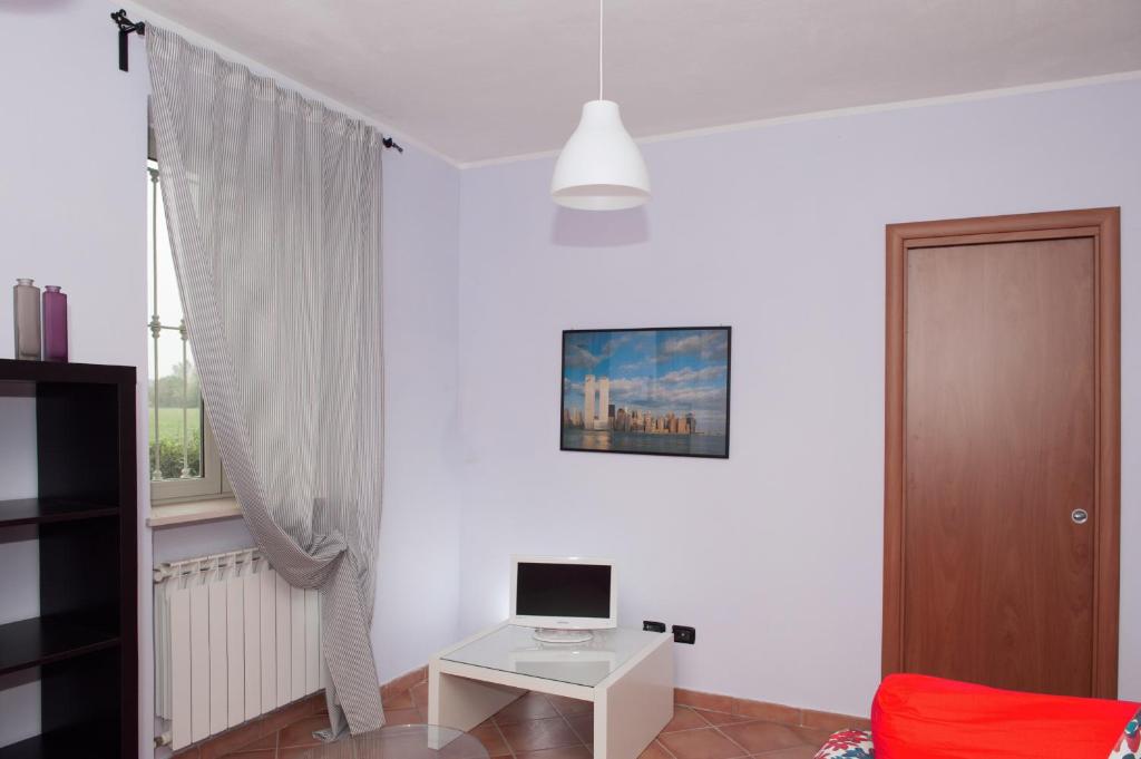 TV a/nebo společenská místnost v ubytování B&B La Pellizzera