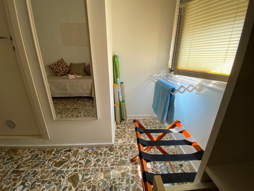 Postel nebo postele na pokoji v ubytování Rossocorallo Rooms