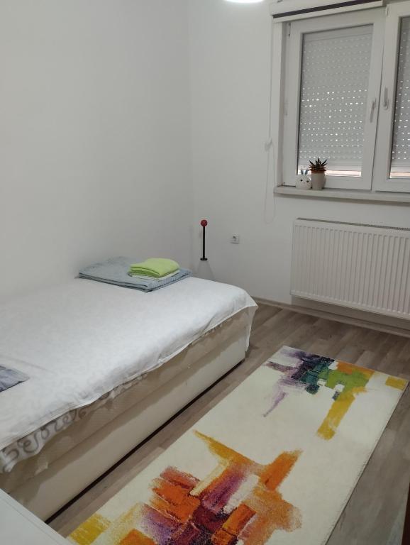 Ліжко або ліжка в номері Apartman All seasons