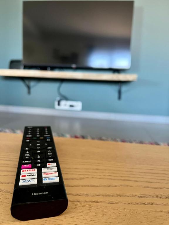 TV a/nebo společenská místnost v ubytování Happy Duplex