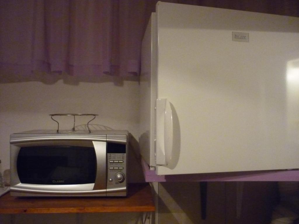 Kuchyň nebo kuchyňský kout v ubytování Rooms Duran