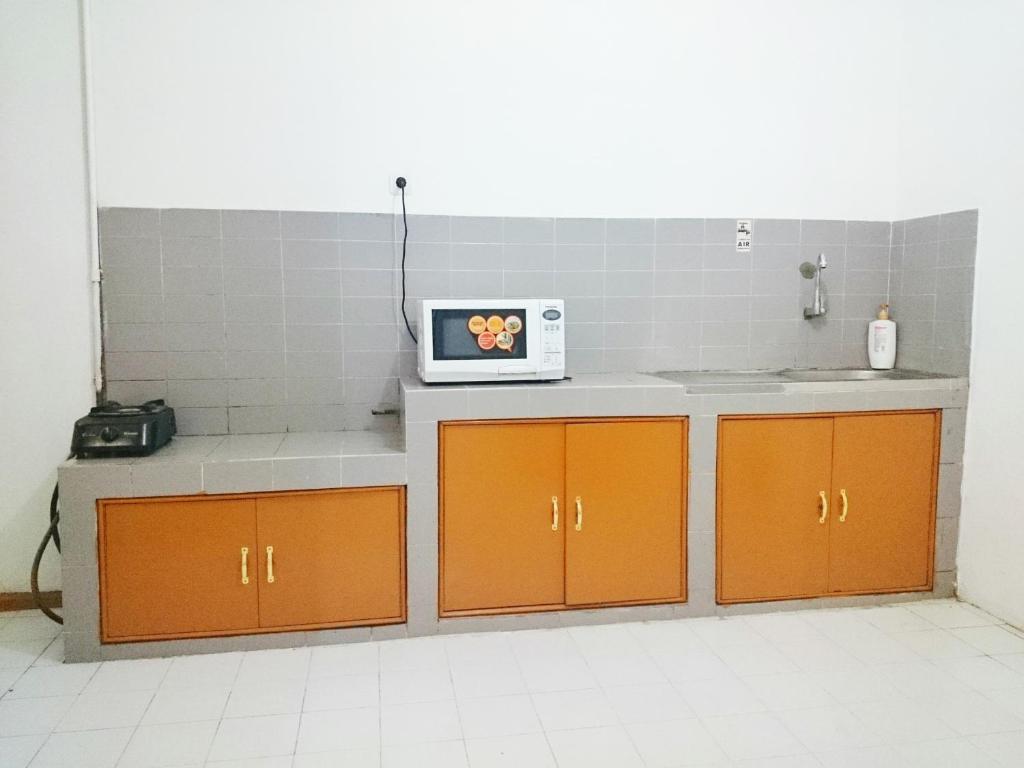 Kuchyň nebo kuchyňský kout v ubytování Hostel Bogor