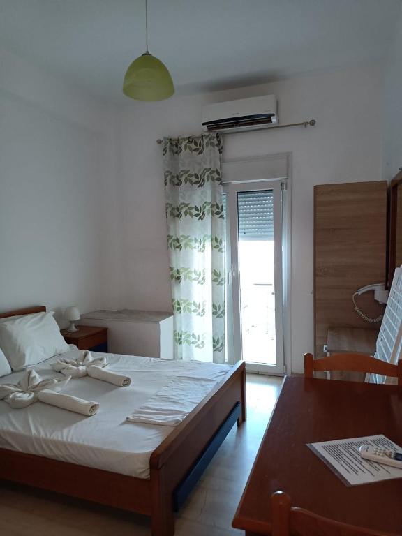 Postel nebo postele na pokoji v ubytování Sea View Studios, Harbour Beach, Bali