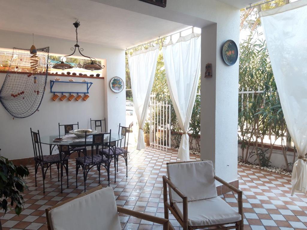 Posedenie v ubytovaní Casa Perciata - Locazione Turistica