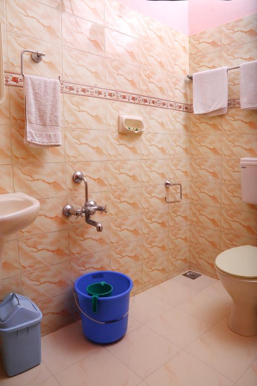Koupelna v ubytování Chiramel Residency