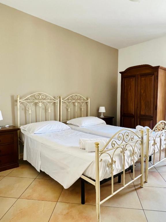 Posteľ alebo postele v izbe v ubytovaní Città Dei Templi GuestHouse