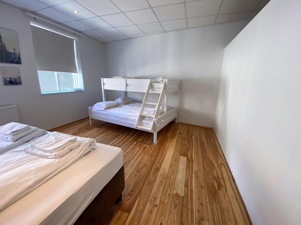 Postel nebo postele na pokoji v ubytování Day Dream Vesturgata 17 Reykjavik