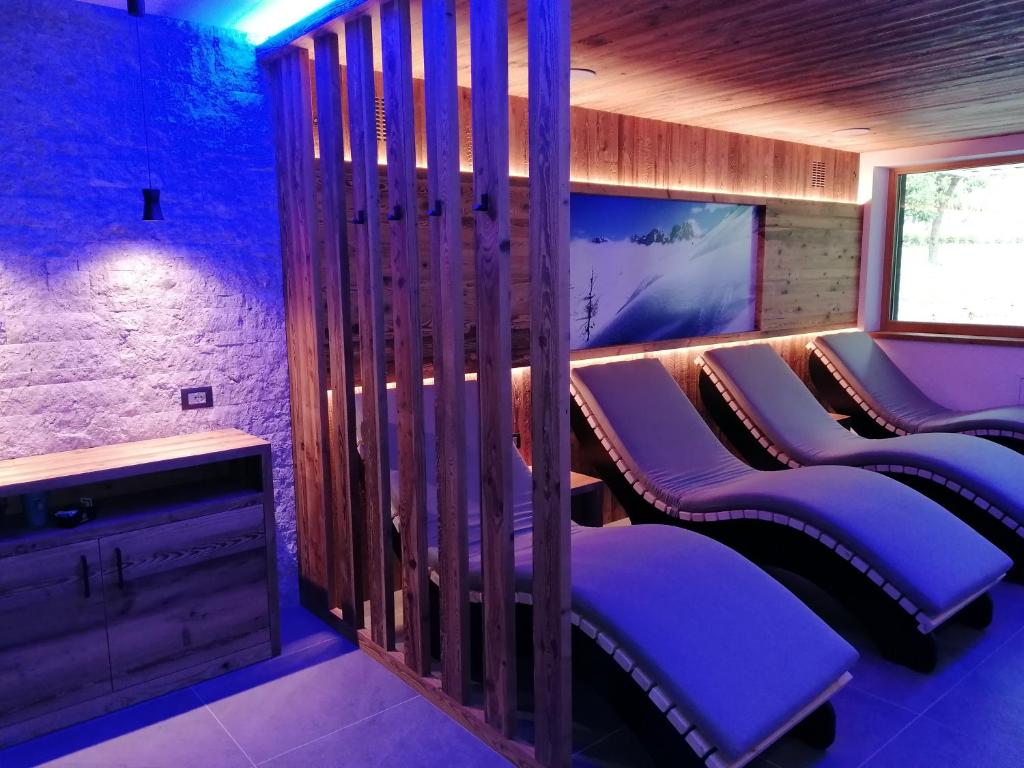 Posezení v ubytování DOLOMITES B&B - Suites, Apartments and SPA