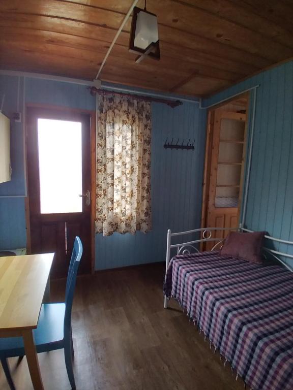 Postel nebo postele na pokoji v ubytování Апарт-отель "У речки"
