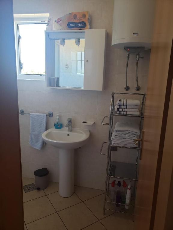 Kúpeľňa v ubytovaní Apartmani Čiklić