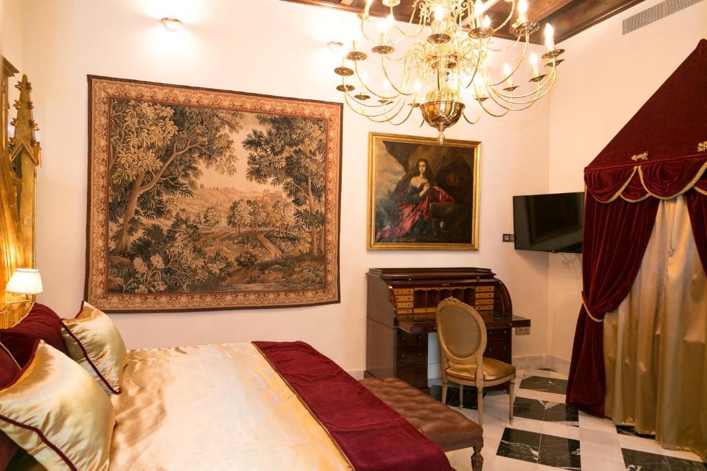 TV a/nebo společenská místnost v ubytování Hotel Ateneo Sevilla