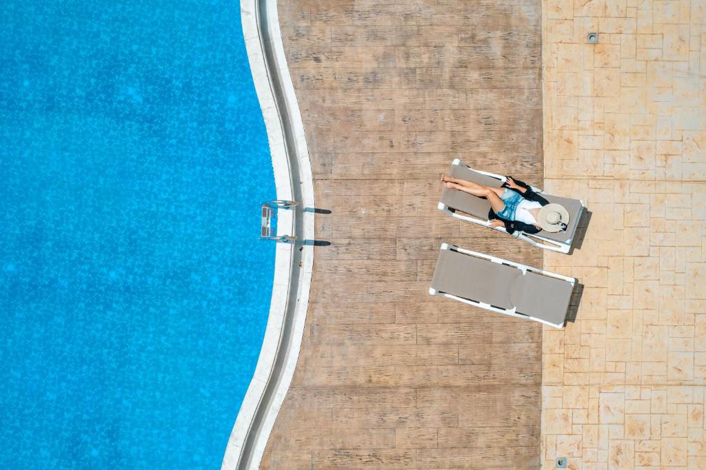 Bazén v ubytování Hotel Olea nebo v jeho okolí