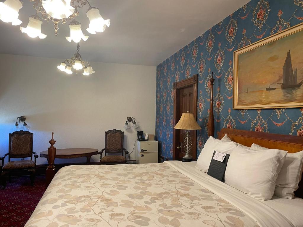 Postel nebo postele na pokoji v ubytování Manresa Castle