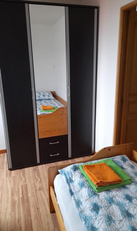 Postel nebo postele na pokoji v ubytování Riegrova