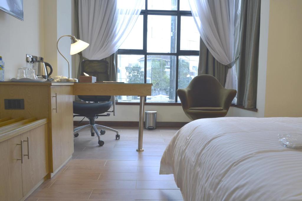 Postel nebo postele na pokoji v ubytování La Maison Royale