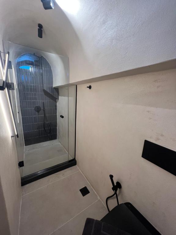Koupelna v ubytování ArmonOia Suites