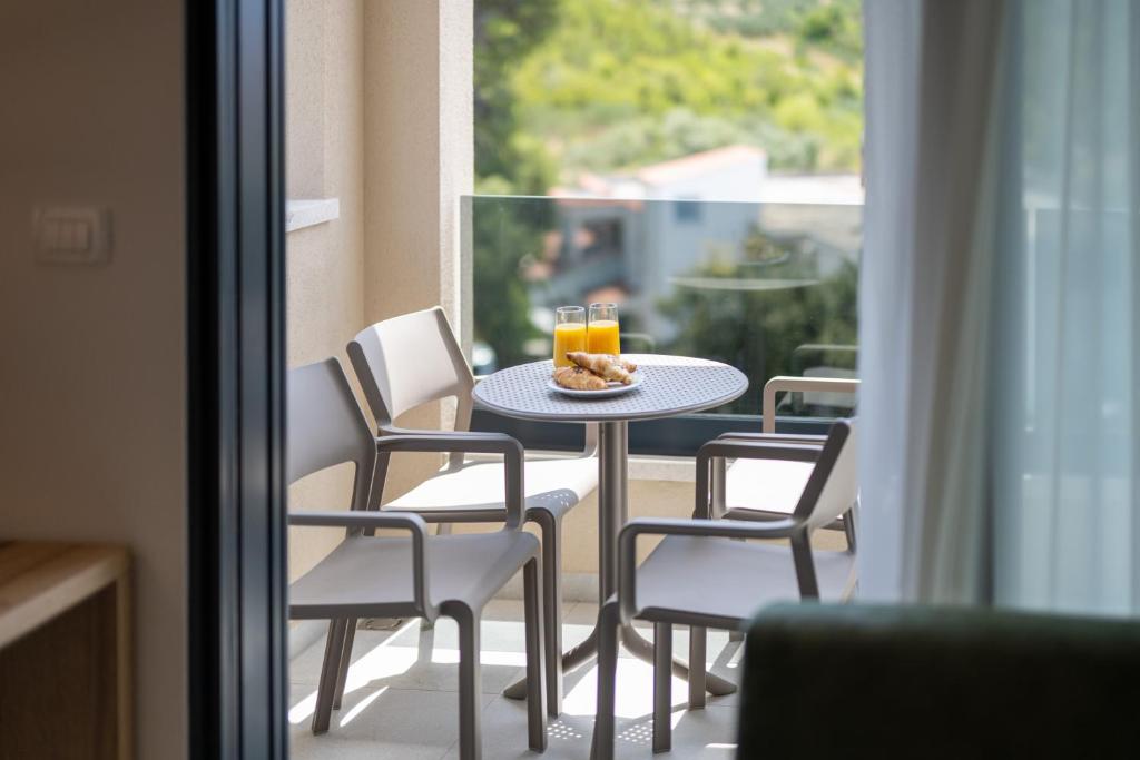 Nápoje v ubytování Aparthotel Remaneo