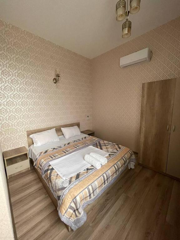Postel nebo postele na pokoji v ubytování Hotel Alley