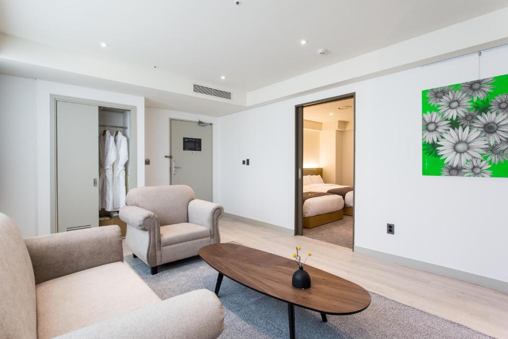 Posezení v ubytování Interburgo Hotel Wonju