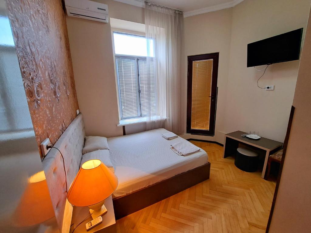 Televiisor ja/või meelelahutuskeskus majutusasutuses Liza's home