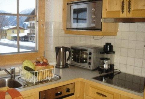 Kuchyň nebo kuchyňský kout v ubytování Ferienwohnung Suntinger