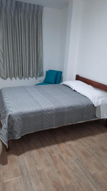 Postel nebo postele na pokoji v ubytování Hospedaje Margarita