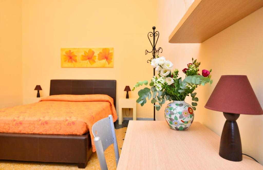 Postel nebo postele na pokoji v ubytování Balcone su Otranto