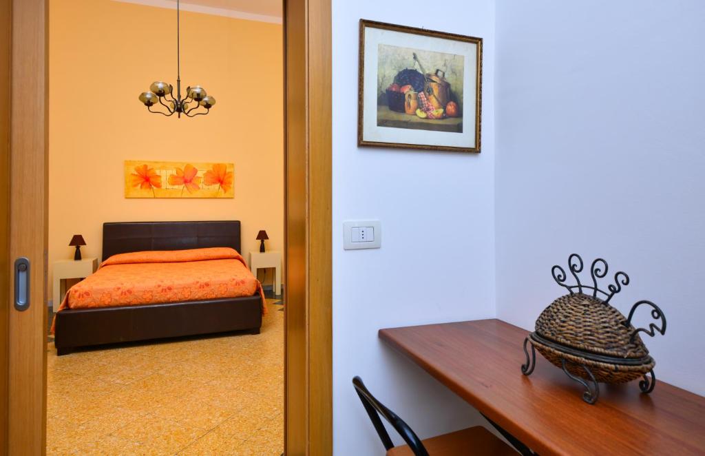 Postel nebo postele na pokoji v ubytování Balcone su Otranto