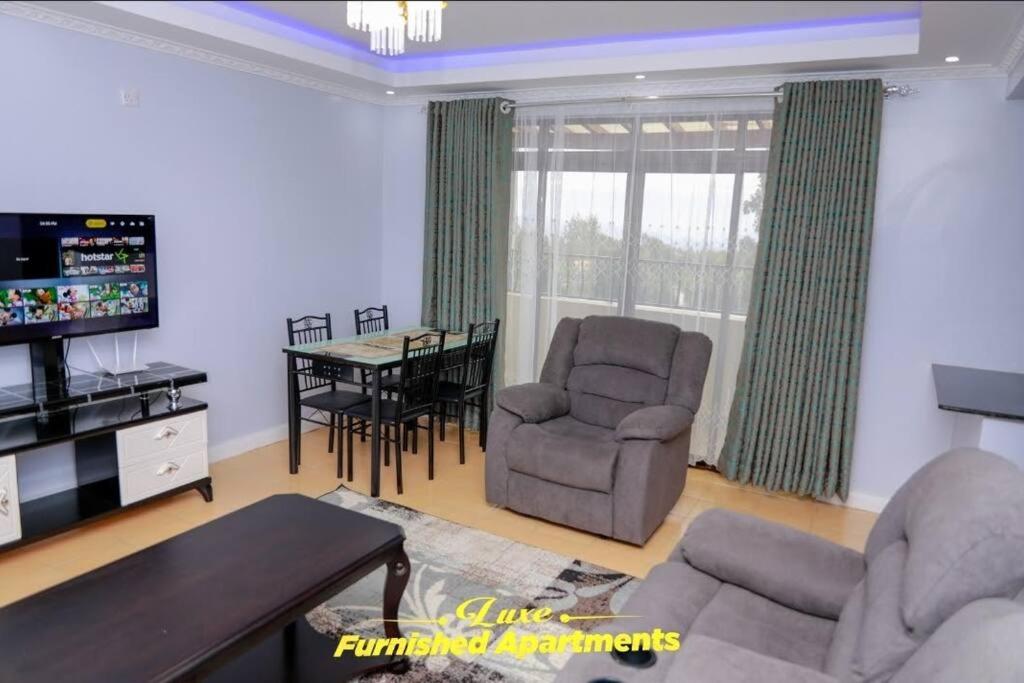Posezení v ubytování Luxe Furnished Apartments