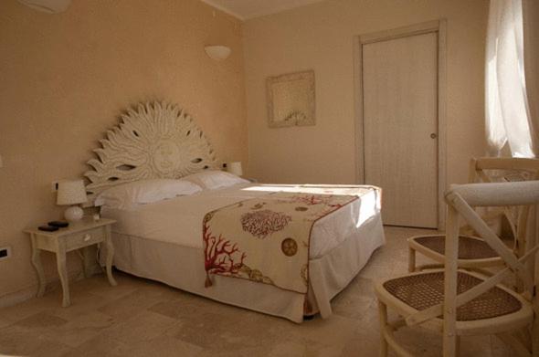 Postel nebo postele na pokoji v ubytování Hotel Bagni Lido