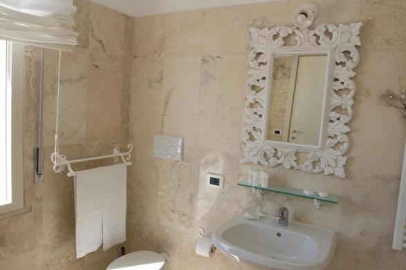 Koupelna v ubytování Hotel Bagni Lido