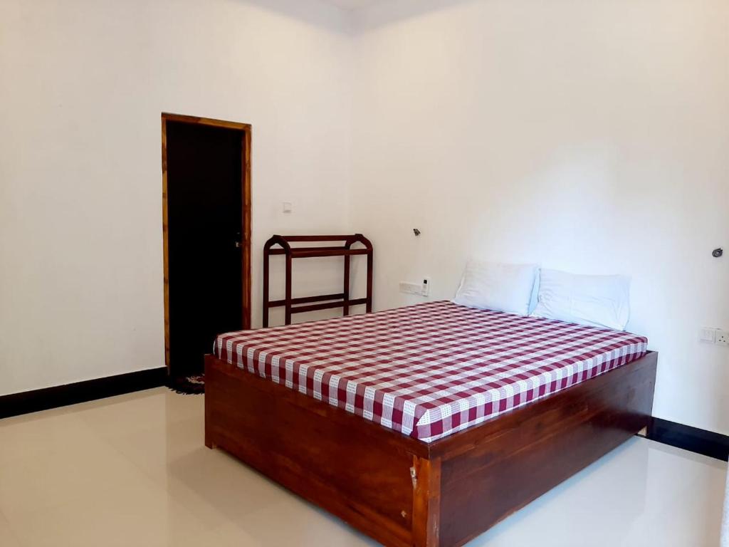 Postel nebo postele na pokoji v ubytování Hotel krish