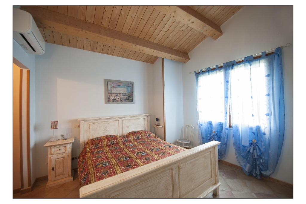 A bed or beds in a room at Bed & Breakfast Montesterlino