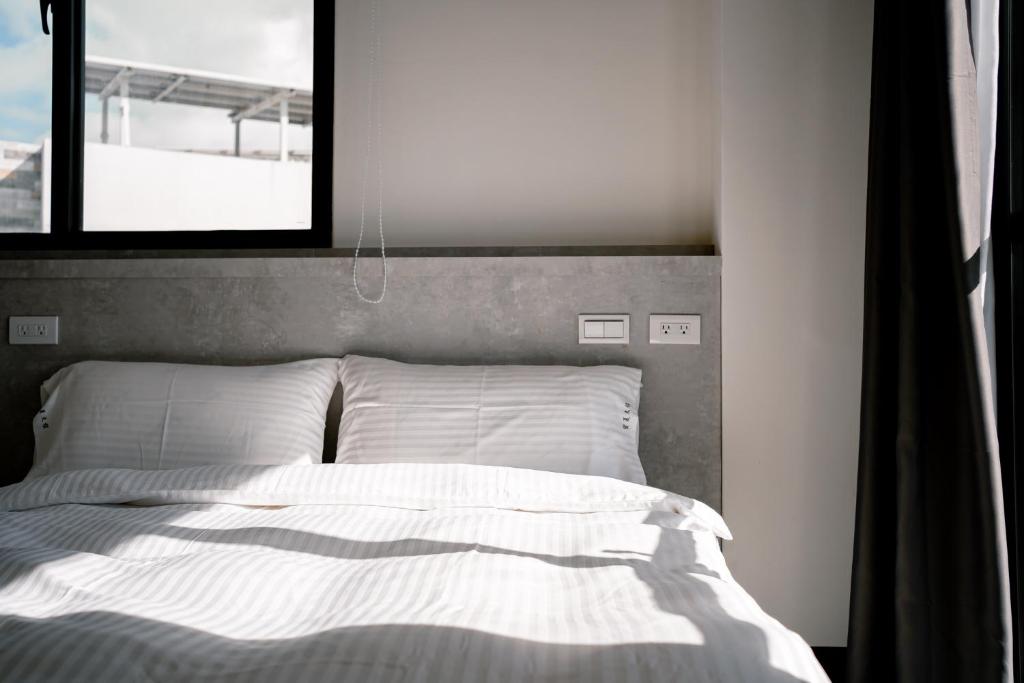 Postel nebo postele na pokoji v ubytování Sweet Summer Homestay